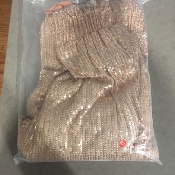 Sequin pants and white sweater outfit. - Picture 3 of 3